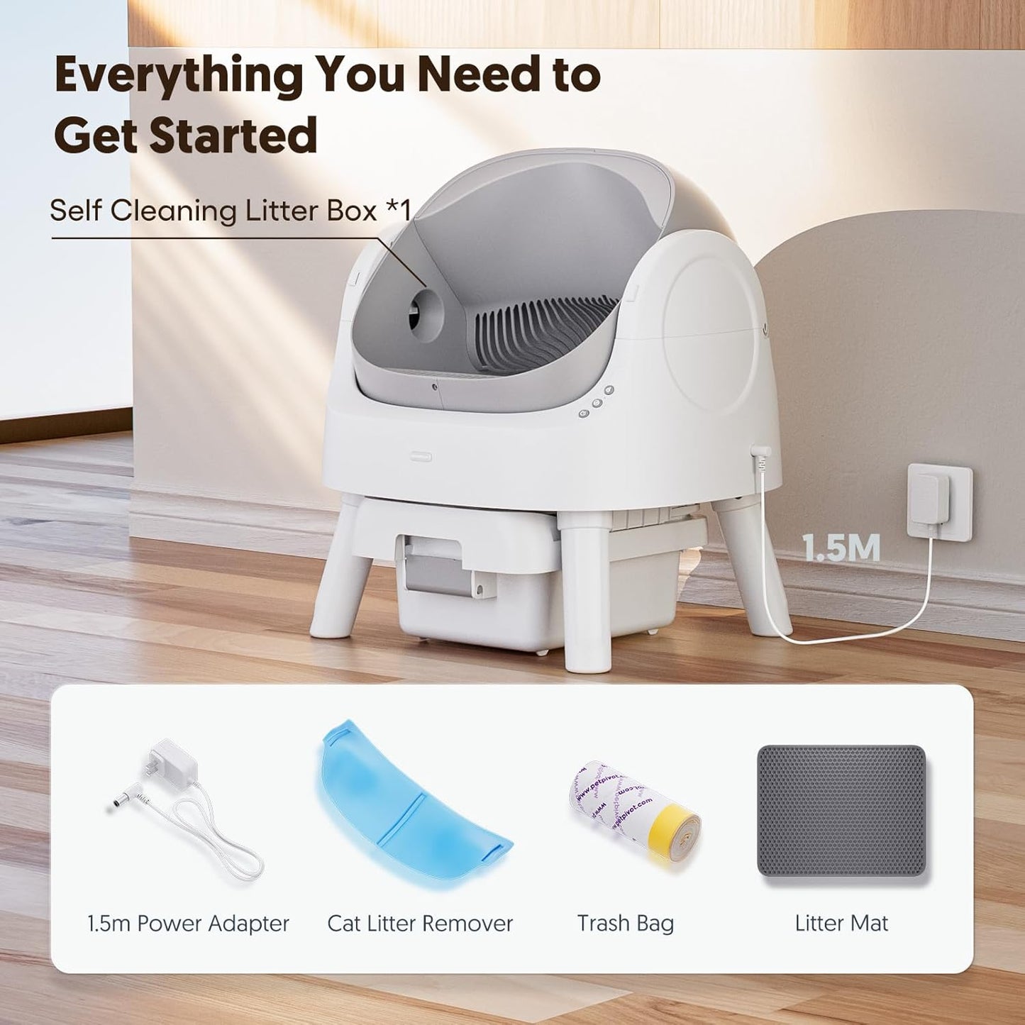 Self cleaning litter box with accessories on a wooden floor